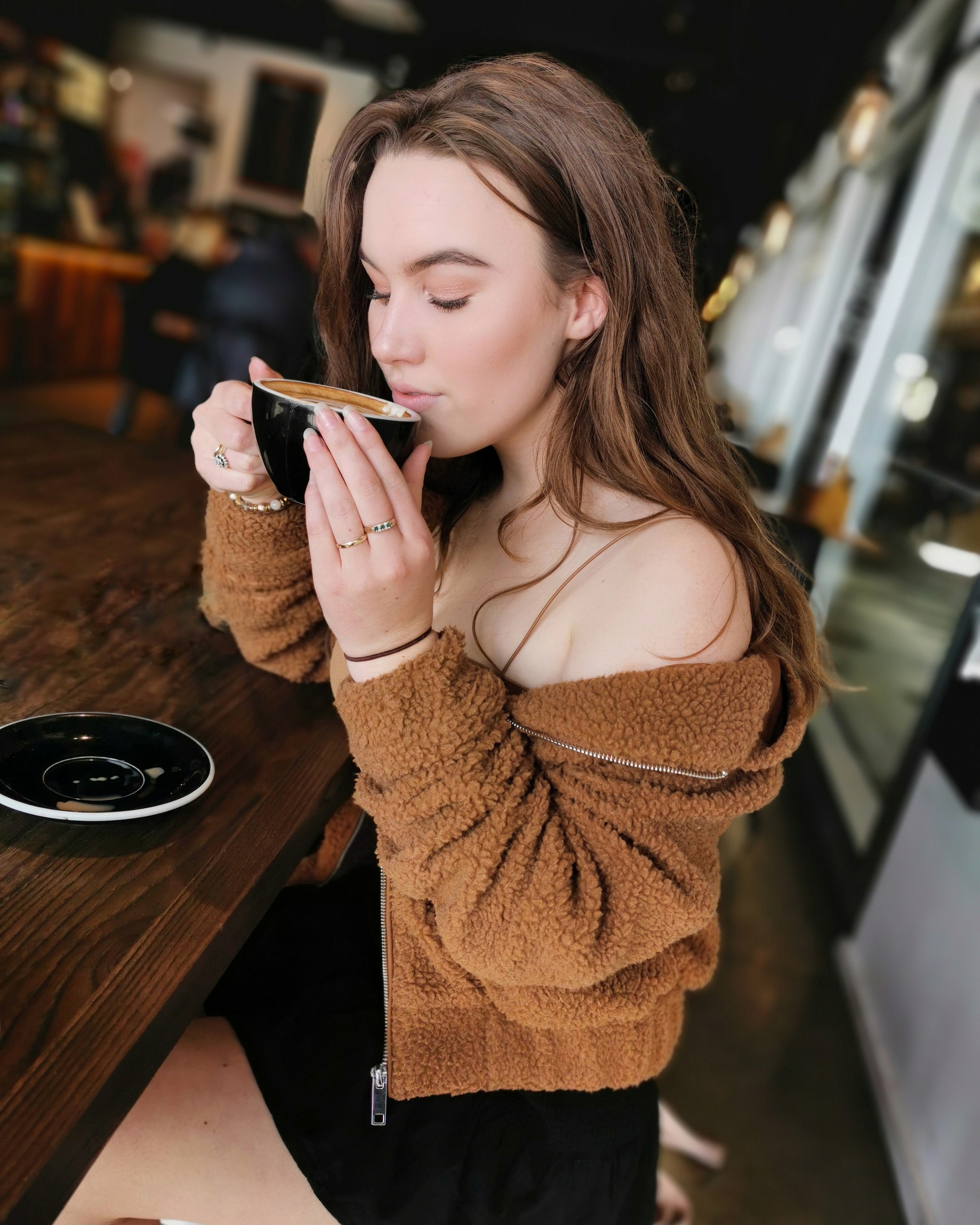 Photo by Andrew Lane: https://www.pexels.com/photo/selective-focus-photo-of-woman-sitting-at-table-in-coffee-shop-sipping-coffee-2539295/