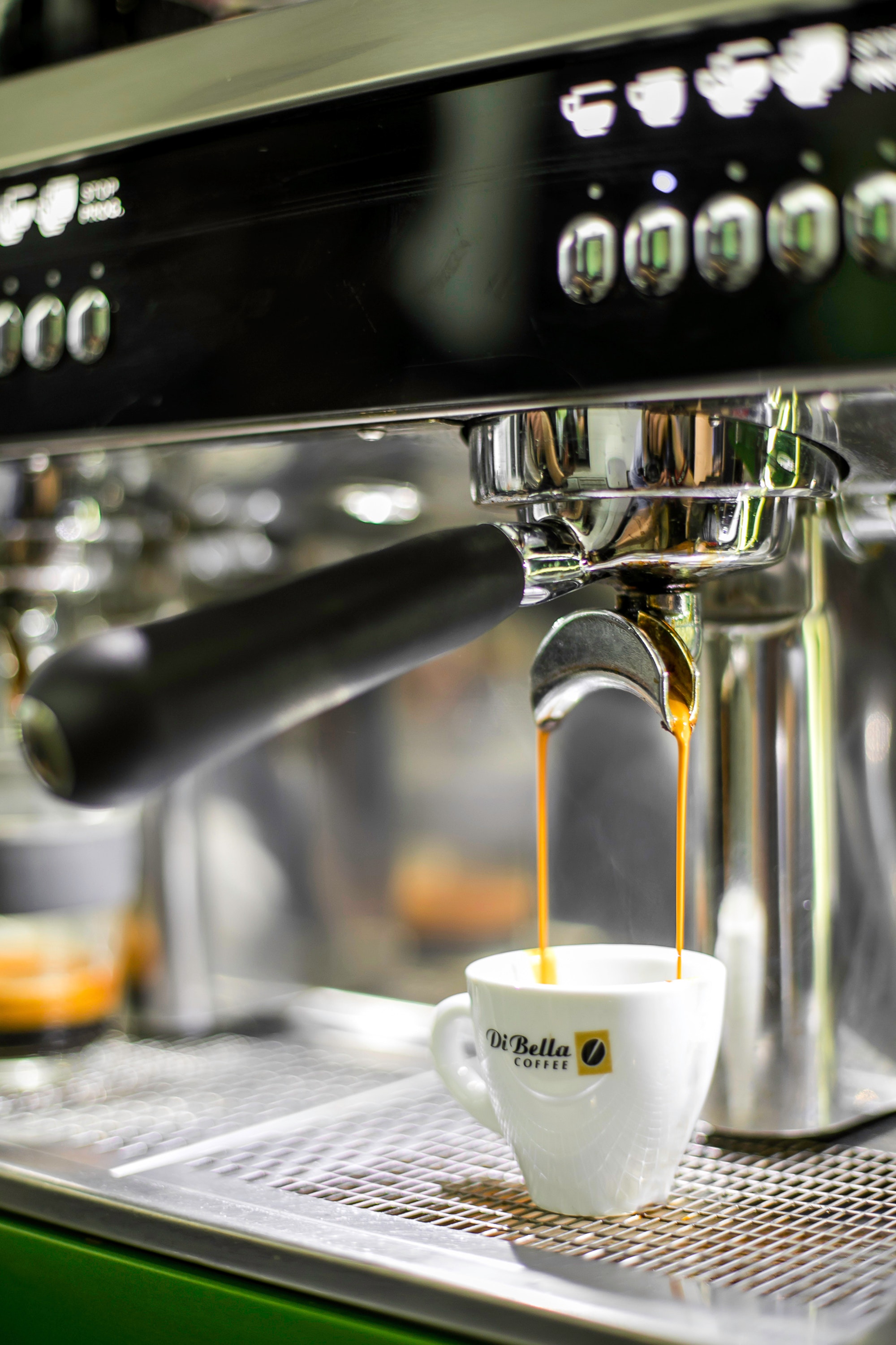 Photo by Di Bella Coffee: https://www.pexels.com/photo/white-ceramic-di-bella-espresso-cup-on-black-and-gray-espresso-machine-1233529/